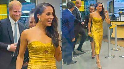 Meghan Markle all smiles in gold gown alongside Prince Harry for post-coronation award - www.foxnews.com - Britain - New York