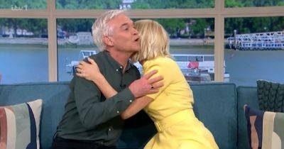 This Morning viewers say 'OMG' as Holly Willoughby issues warning in embrace with Phillip Schofield before sudden exit - www.manchestereveningnews.co.uk - Manchester