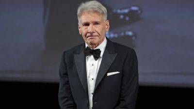 Harrison Ford Holds Back Tears During Standing Ovation After ‘Indiana Jones 5’ Premiere (Video) - thewrap.com - Indiana - county Harrison - county Ford