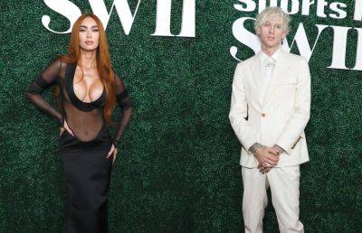 Machine Gun Kelly Supports ‘Hot’ Megan Fox At ‘Sports Illustrated’ Event - etcanada.com - Hollywood - Tennessee