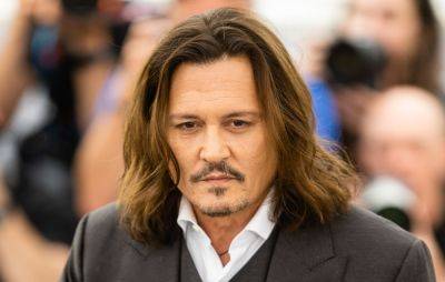 Johnny Depp’s “rotting” teeth steal limelight at Cannes Film Festival - www.nme.com - Indiana - county Barry