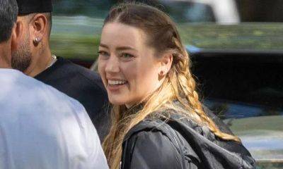 Amber Heard is all smiles in Madrid amid Johnny Depp teeth controversy - us.hola.com - Spain - Madrid