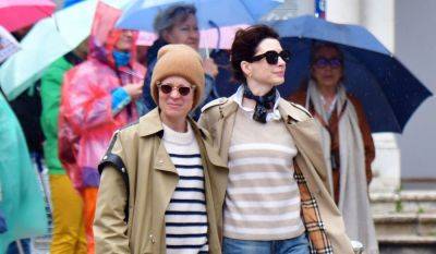 Anne Hathaway Wears Matching Outfits with Stylist Erin Walsh While Sightseeing in Rainy Venice - www.justjared.com - Italy