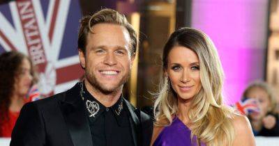 Olly Murs' fiancée Amelia Tank shows off bag with his face on it at her hen party - www.ok.co.uk - London
