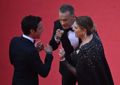 Rita Wilson Sets Record Straight About Photos Showing Her And Tom Hanks Appearing To Scold A Man On Cannes Red Carpet - etcanada.com - city Asteroid