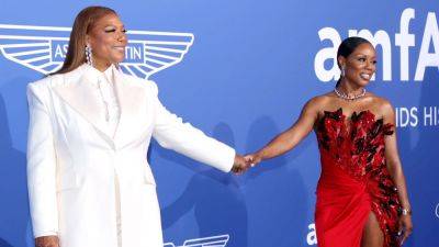 Queen Latifah Holds Hands With Eboni Nichols on amfAR Gala Carpet - www.etonline.com - France - USA - Las Vegas