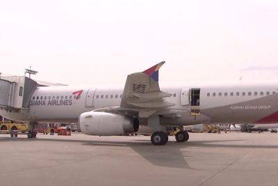 Chaos In The Air -- Passenger Opens Emergency Door MID-FLIGHT Over South Korea! - perezhilton.com - South Korea - North Korea