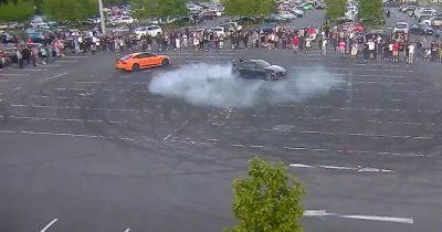 Crowds watch on as 'dangerous drivers' cruise around Trafford Centre car park - www.manchestereveningnews.co.uk - Manchester
