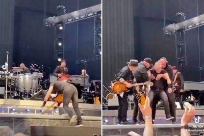 Bruce Springsteen falls on stage, band rushes to help after wipeout - nypost.com - USA - Florida - Indiana - city Amsterdam - city Tampa