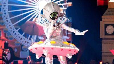 'The Masked Singer': The UFO Crashes in Season 9 Quarterfinals -- See What Surprise Celeb Was Under the Mask! - www.etonline.com - Britain - California