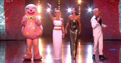 Amanda Holden hailed 'goddess' as she wows Britain's Got Talent viewers with toned abs in white co-ord - www.manchestereveningnews.co.uk - Britain