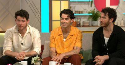 Lorraine viewers say 'poor fellas' as they think they've spotted Jonas Brothers' true feelings about appearance - www.manchestereveningnews.co.uk - Australia