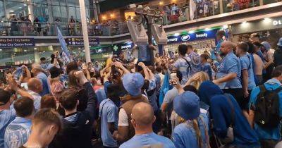 Hundreds of jubilant City fans celebrate at Piccadilly station after trophy parade - www.manchestereveningnews.co.uk - Manchester - city Istanbul