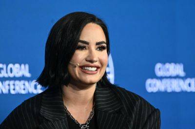 Demi Lovato reveals why using they/them pronouns was ‘absolutely exhausting’ - www.foxnews.com - Britain - Spain