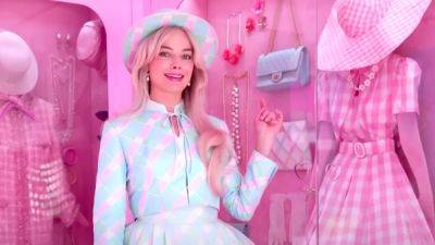 Margot Robbie Gives Tour of ‘Barbie’ Dreamhouse, Including the ‘Magical Wardrobe’ (Video) - thewrap.com - city Palm Springs