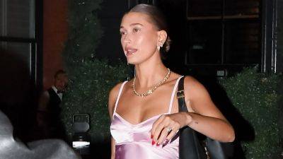 Hailey Bieber and Katie Holmes Are Breezing Through Summer in the Same Unexpected Slip Dress Combo - www.glamour.com - New York - New York - Ukraine