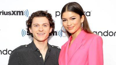Dive Into Zendaya and Tom Holland's Romance: From 'Spiderman' Co-Stars to Real-Life Couple - www.etonline.com