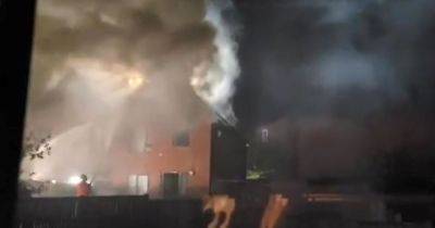 Dramatic video shows smoke engulfing house in Bolton as firefighters tackle blaze - www.manchestereveningnews.co.uk - Manchester