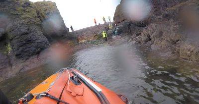 Boy falls 15ft from rocks at Scots harbour sparking RNLI rescue mission - www.dailyrecord.co.uk - Scotland - Beyond