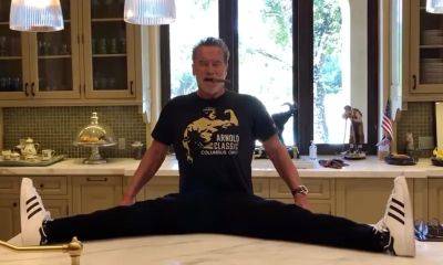 Arnold Schwarzenegger appears to do the splits on his kitchen counter while smoking a cigar - us.hola.com - California