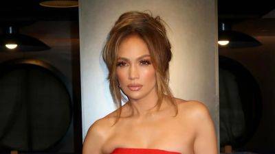 Star Sightings: Jennifer Lopez Stuns in a Red Feathery Dress, Harry Styles Enjoys a Morning Run in London - www.etonline.com - France - Paris - London - New York - California - Italy - Montana - Lake - county Addison