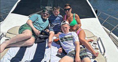 Coleen Rooney looks incredible in green bikini during boat trip with Wayne and sons - www.ok.co.uk
