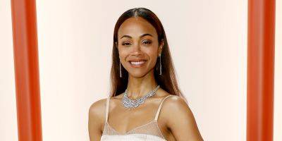 Zoe Saldana Offers a Glimpse at a Special Tattoo On Her Side in a Topless Video - www.justjared.com