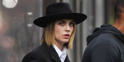 Cara Delevingne Wears Flat Top Hat & Pink Slippers on 'AHS' Set in NYC - www.justjared.com - USA - county Story