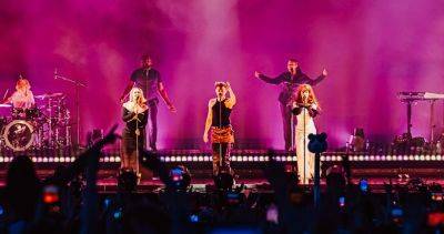 Girls Aloud's Kimberley Walsh and Nicola Roberts join Years & Years on stage at Mighty Hoopla - www.officialcharts.com