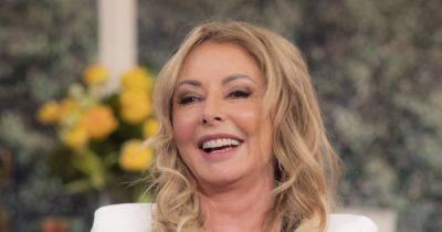 Carol Vorderman gives herself a DIY haircut with gorgeous results - www.ok.co.uk - South Africa