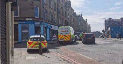 Bomb squad race to Scots street after suspected grenades found in property - www.dailyrecord.co.uk - Scotland - China - Beyond