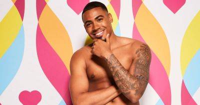 Love Island's Tyrique's tattoo meanings with family tribute to unique clock - www.ok.co.uk - Spain - city Essex - county Love