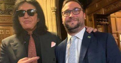 Christian Wakeford MP apologises and deletes tweet of him posing with Kiss rocker Gene Simmons - www.manchestereveningnews.co.uk - Britain