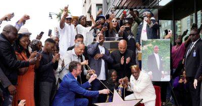 Moment Tupac’s Hollywood Walk of Fame star revealed as rapper posthumously honoured - www.msn.com - Hollywood
