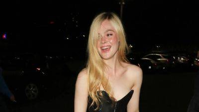 Elle Fanning Perfectly Blended the Corset and Baggy Pants Trends - www.glamour.com - Paris - Los Angeles