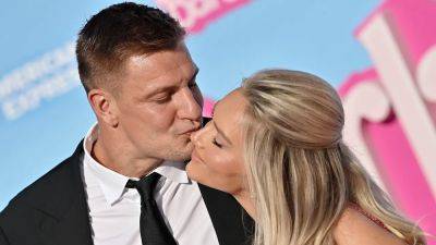 Camille Kostek, Rob Gronkowski channel Barbie and Ken as they pack on the PDA at premiere - www.foxnews.com