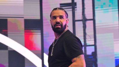 Drake Kisses Rapper Sexyy Red, Calls Her His 'Rightful Wife' - www.etonline.com - New York - county St. Louis