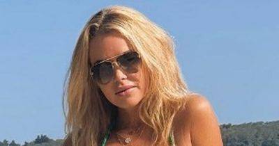 Amanda Holden, 52, flaunts incredible figure in bikini during romantic trip with husband - www.ok.co.uk - Britain