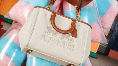 Save 50% On Handbags, Shoes and More at Coach's Massive Summer Sale This Weekend Only - www.etonline.com - city Sandal