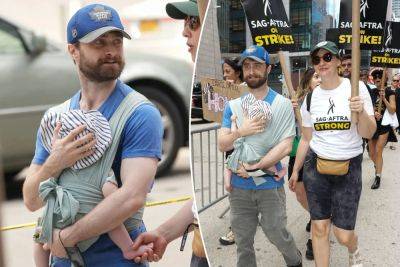Daniel Radcliffe, girlfriend Erin Darke bring newborn baby to SAG-AFTRA picket line in NYC - nypost.com - Hollywood