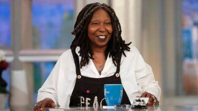 Whoopi Goldberg Wears Decapitated Barbie Head Shoes on 'The View,' Defends the Movie - www.etonline.com - China - Vietnam