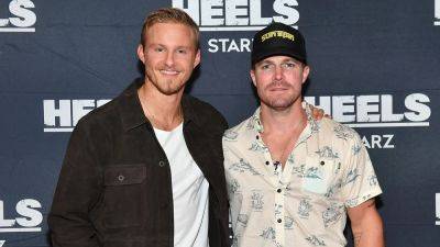 Stephen Amell and Alexander Ludwig Talk Fatherhood, Cuddle Sessions and 'Heels' Season 2 (Exclusive) - www.etonline.com - state Georgia - county Allen