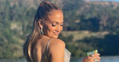 Jennifer Lopez Celebrates 54th Birthday Dancing on Tables in a Sparkly a Dress - www.usmagazine.com