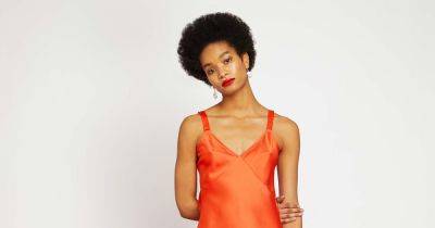 We've found the perfect £29 dupe for Ralph Lauren's £549 orange satin midi dress - www.ok.co.uk - India