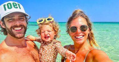 Shirtless Thomas Rhett Soaks Up ‘Beach Time’ With Wife Lauren Akins and Youngest Daughter Lillie - www.usmagazine.com - New York - Tennessee - county Buffalo