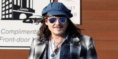 Johnny Depp Is All Smiles While Walking With a Cane After Ankle Injury - www.justjared.com - New York - state Massachusets - state New Hampshire