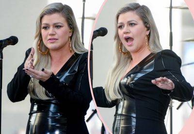 Kelly Clarkson Drops Shady NSFW Response To Female Fan's 'Hall Pass' Sign! Watch! - perezhilton.com