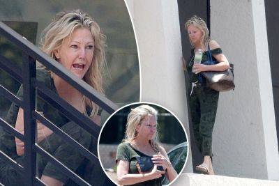Heather Locklear seen balancing on ledge, talking to herself in alarming photos - nypost.com - city Spin