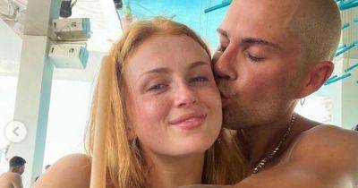 Fans melt as Maisie Smith shares Max George throwback holiday picture with 'cute' message - www.manchestereveningnews.co.uk - city Abu Dhabi