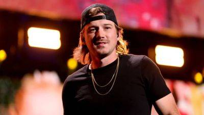 Morgan Wallen Debuts Shaved Head at Ohio Concert: 'I Didn't Like My Long Hair Anymore' - www.etonline.com - Ohio - Columbus, state Ohio